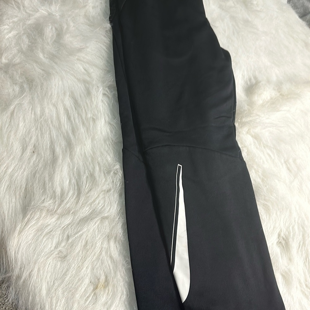 Boys track Nike pants. Excellent condition. Size md.